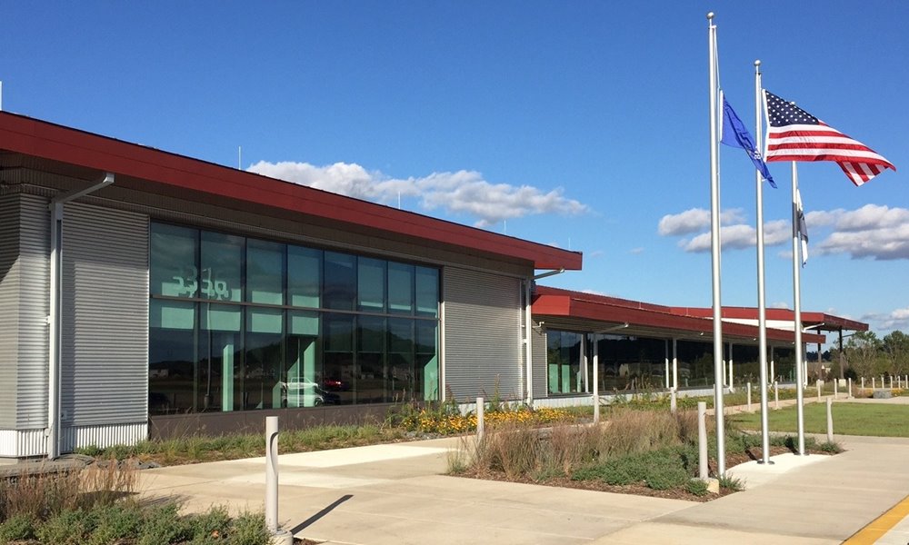 A building with flags flying in front